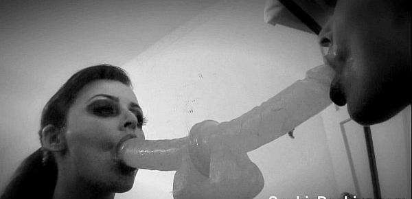  Slut Sophie Dee stuffs her mouth with a big dildo!